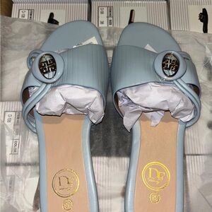 Light Blue Women's Slide Mules with Decorative Emblem